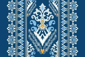 ikat floreale paisley ricamo su blu sfondo.ikat etnico orientale modello tradizionale.azteco stile astratto vettore illustrazione.disegno per trama, tessuto, abbigliamento, avvolgimento, decorazione, sciarpa, tappeto.