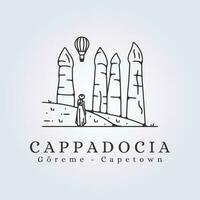 Cappadocia goreme paesaggio logo vettore illustrazione cartello simbolo icona sfondo con donna nel telaio design