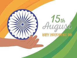 felice giorno dell'indipendenza india, mano che tiene lo sfondo della bandiera della ruota vettore