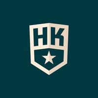 iniziale HK logo stella scudo simbolo con semplice design vettore