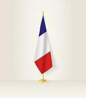 Francia bandiera su un' bandiera In piedi. vettore