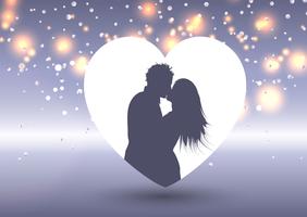 Silhouette di una coppia che si bacia in un cuore vettore