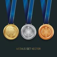 set di medaglie d'oro argento e bronzo vettore