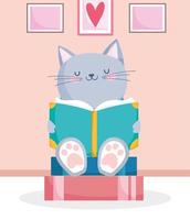 piccolo gatto con un libro vettore