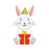 grigio coniglio si siede con un' regalo nel suo zampe. un' carino coniglio nel un' festivo berretto celebra vacanza vettore