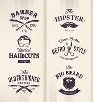 Emblemi del negozio di barbiere vettore