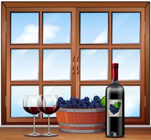 Vino rosso in bicchieri con un background barrell di uva vettore