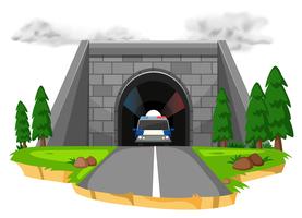 Auto della polizia nel tunnel vettore