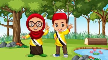 i bambini del Brunei indossano abiti tradizionali nella scena della foresta vettore