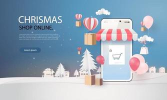 arte della carta shopping online su smart phone giorno di natale stagione invernale vettore