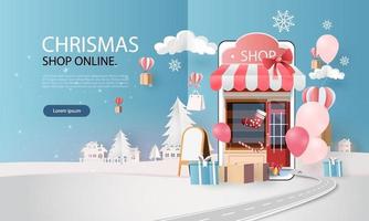 arte della carta shopping online su smart phone giorno di natale stagione invernale vettore