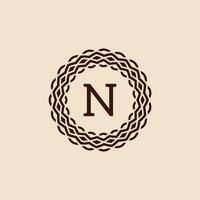 semplice e elegante iniziale lettera n ornamentale cerchio telaio logo vettore