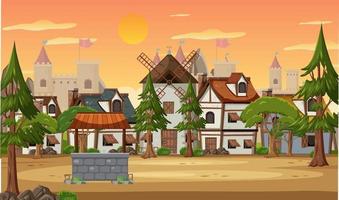 scena del villaggio medievale con mulino a vento e case vettore