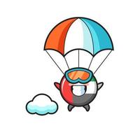 Il fumetto della mascotte del distintivo della bandiera degli Emirati Arabi Uniti sta facendo paracadutismo con un gesto felice vettore