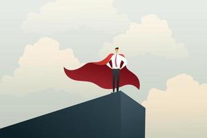 uomo d'affari del supereroe in piedi su una scogliera mostra il successo del potere.