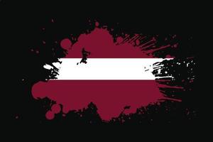 bandiera lettonia con design effetto grunge vettore