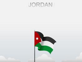bandiera della giordania che sventola sotto il cielo bianco