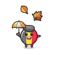 cartone animato del simpatico distintivo della bandiera del Belgio che tiene un ombrello in autunno vettore