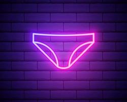 linea al neon incandescente icona biancheria intima donna isolata su brick vettore