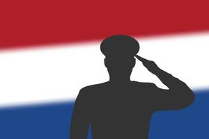 sagoma di saldatura su sfondo sfocato con bandiera dei Paesi Bassi. vettore