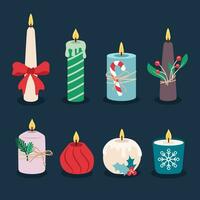 Natale ardente candele impostato nel cartone animato piatto stile. Natale e nuovo anno decorazioni vettore