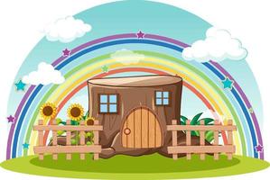 casa di tronchi fantasy con arcobaleno nel cielo vettore