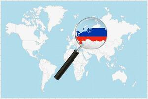 ingrandimento bicchiere mostrando un' carta geografica di Russia su un' mondo carta geografica. vettore