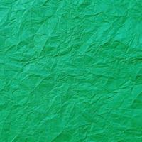 sfondo di texture di carta verde stropicciata realistico vettore