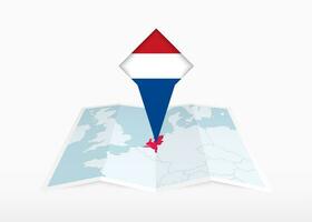 Olanda è raffigurato su un' piegato carta carta geografica e appuntato Posizione marcatore con bandiera di Olanda. vettore