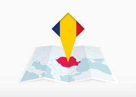 Romania è raffigurato su un' piegato carta carta geografica e appuntato Posizione marcatore con bandiera di Romania. vettore