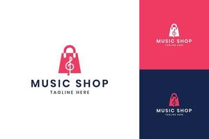 design del logo dello spazio negativo del negozio di musica vettore