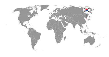 mappa pin con bandiera della corea del sud sulla mappa del mondo. illustrazione vettoriale. vettore