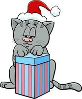 divertente cartone animato gatto con regalo su Natale tempo vettore