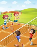 Bambini che giocano a tennis in campo vettore