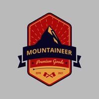 logo vintage con emblema di montagna e avventura vettore