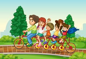 Famiglia in bicicletta nel parco vettore