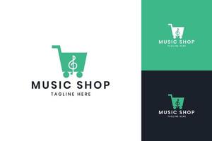 design del logo dello spazio negativo del negozio di musica vettore