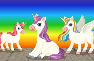 unicorni su sfondo sfumato arcobaleno vettore