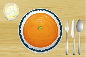 Una zuppa di arancia su un piatto vettore