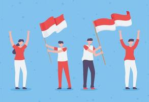 persone con bandiera indonesiana vettore