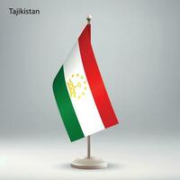 bandiera di tagikistan sospeso su un' bandiera In piedi. vettore