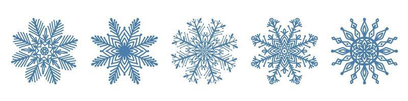 set di icona fiocco di neve blu disegnato a mano isolato su priorità bassa bianca. elemento di design invernale fiocco di neve collezione di illustrazioni vettoriali in cristallo gelo.