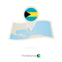 piegato carta carta geografica di il Bahamas con bandiera perno di bahamas. vettore