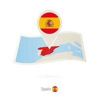 piegato carta carta geografica di Spagna con bandiera perno di Spagna. vettore