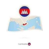 piegato carta carta geografica di Cambogia con bandiera perno di Cambogia. vettore