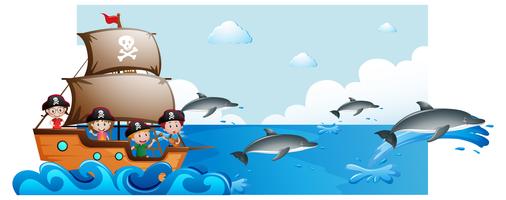 Scena dell&#39;oceano con bambini sulla nave e delfini sott&#39;acqua vettore