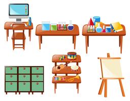 Diversi oggetti scolastici sul tavolo vettore