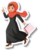 Adesivo personaggio dei cartoni animati della donna musulmana che tiene la borsa della spesa su sfondo bianco vettore