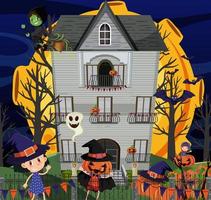 casa stregata di halloween di notte vettore