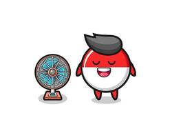 la simpatica bandiera dell'indonesia è in piedi di fronte al ventilatore vettore